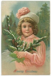Postal de Navidad niña en rosa vestido con rama de piña c.1908 #49 - Imagen 1 de 2