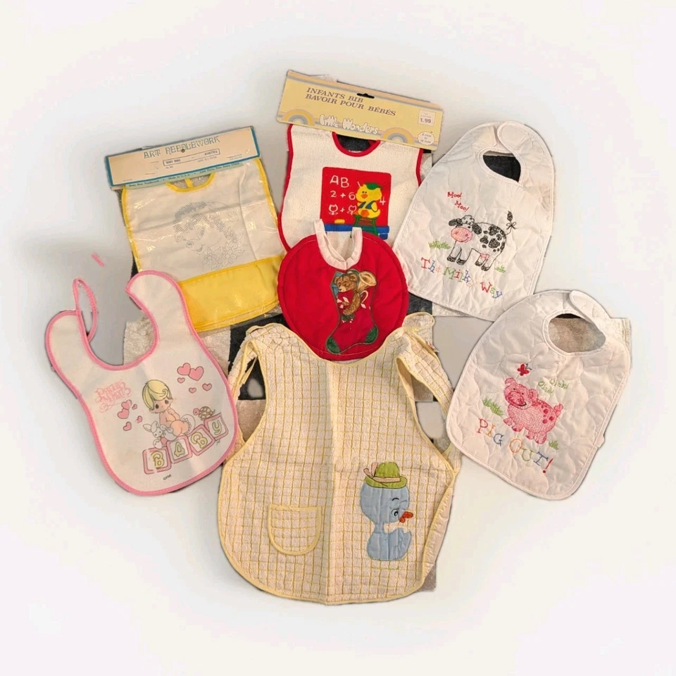 Lote de 7 baberos de bebé vintage años 70 - Preciosos momentos, animales, Navidad, bordados  Foto 1 de 2