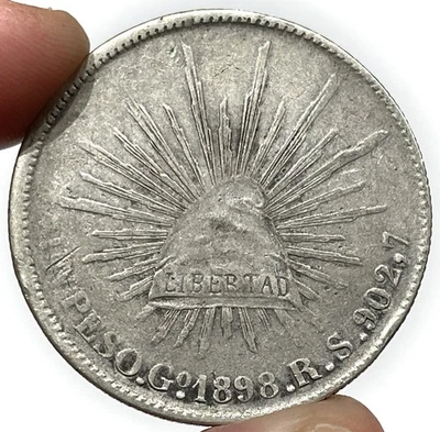 1898 Go RS Silver Mexico 1 Peso Cap & Rays Coin Condition Very Fine - Image 1 of 2
