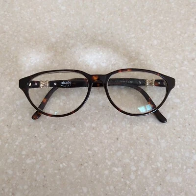 Monturas de gafas para mujer Nicole Miller casi nuevas 18 en Tortoise 53-15-140 Foto 1 de 4