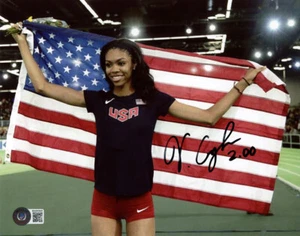 VASHTI CUNNINGHAM SIGNED 8x10 PHOTO OLYMPIC TRACK & FIELD HIGH JUMP BECKETT BAS - Picture 1 of 2