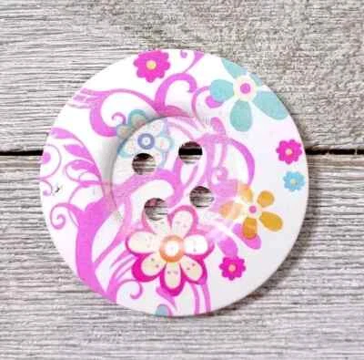 large wood sewing button 4 holes 2 inch blue pink flower swirls - Image 1 of 2