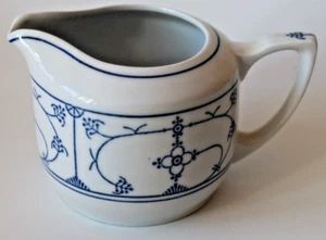 Jäger  Thrg. Strohblume, Indisch blau saks Milchkännchen neuere DDR Marke - Bild 1 von 7