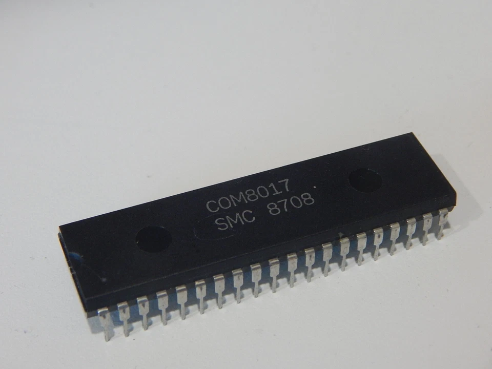 SMC COM8017 Universal Asynchronous Receiver/Transmitter 40-Pin DIP - FAST SHIP - Image 1 of 1