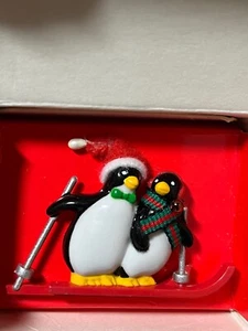 Avon Vintage 1990 Holiday Christmas Penguin Couple Skiing Red Santa Hat Pin - Picture 1 of 7