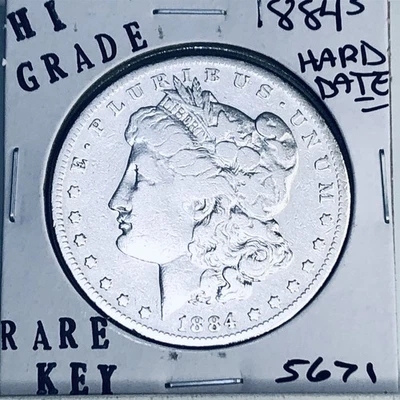Dólar de plata Morgan 1884 S alta calidad genuino EE. UU. COMO NUEVO RARA MONEDA CLAVE 5671 Foto 1 de 3