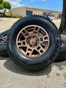 17x8 TRD WHEELS BRONZE RIMS ATX850 TIRES TOYOTA TACOMA 4RUNNER FJ CRUISER 6x5.5 - Picture 1 of 6