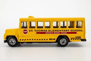 2000 Matchbox #31 International School Bus YELLOW | ST. THOMAS ELEMENTARY | MINT - Picture 1 of 1