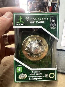 New - BePuzzled Hanayama Level 4 Cast Puzzle - Planet - Ages 12+ | 1 player - Picture 1 of 6