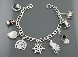 Pulsera vintage de plata esterlina 9 dijes 22,90 gramos - Imagen 1 de 7