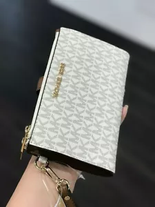 NEU MIT ETIKETT MICHAEL KORS SIGNATURE JET SET REISE DOPPELTER REISSVERSCHLUSS ARMBAND GELDBÖRSE Vanille - Bild 1 von 5