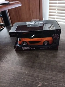 JADA FAST AND FURIOUS MASSSTAB 1:32 HAN'S MAZDA RX-7 BRANDNEU - Bild 1 von 3