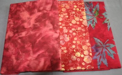 Tela Batik para dejar de fumar - patrón de hojas rojas y acuarela naranja/roja - 1 yarda cada una NUEVO Foto 1 de 4