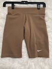 Nike Women’s mid rise tight fit short length compression shorts NWT Brown XS