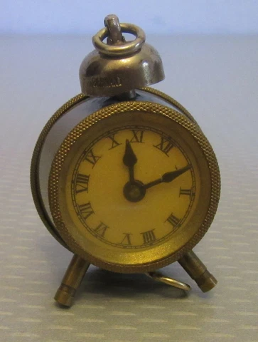 antique ALARM CLOCK TAPE MEASURE figural brass Germany retractable cloth sewing Cover