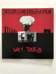 WET TAXIS “From The Archives” LP 1st press RARE Louis Tillet HOT Records - Picture 1 of 6