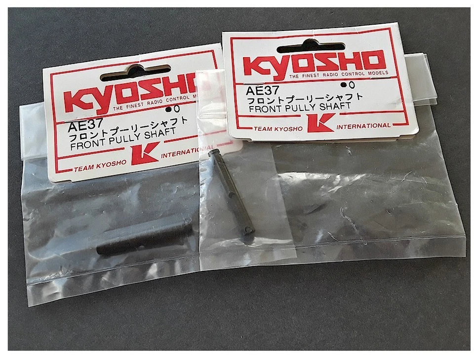 2x-Bags Vintage RC Car AE37 Front Pulley Shaft Pure Ten Alpha Old Stock NIB - Image 1 of 1