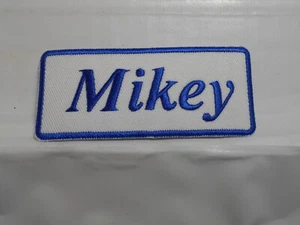 MIKEY  NEW EMBROIDERED  SEW / IRON ON NAME PATCH BLUE ON WHITE - Picture 1 of 2