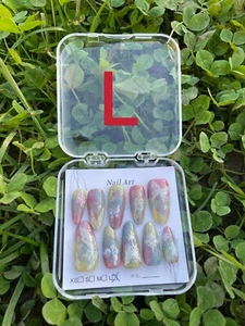 tips per unghie finte/farfalla/mandorla/lunga/multicolore - Foto 1 di 3