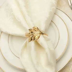 Set 20 anelli tovagliolo oro design foglia per cena e festa per tavoli - Foto 1 di 18