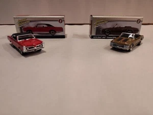 Johnny Lightning Collector Club Tin 1970 Olds Cutlass 442 AND 1967 Pontiac GTO - Picture 1 of 7