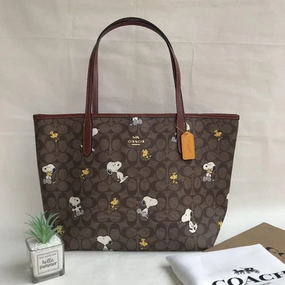 New!! COACH x PEANUTS Snoopy Tote Bag Wood - Image 1 of 4