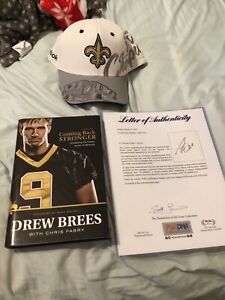Drew Brees signed book with Super Bowl Championship Cap