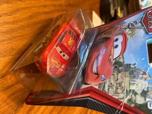 2010 Disney Cars 2 RED #3 LIGHTNING McQUEEN RACING WHEELS sealed FREE SHIPPING - Picture 1 of 3