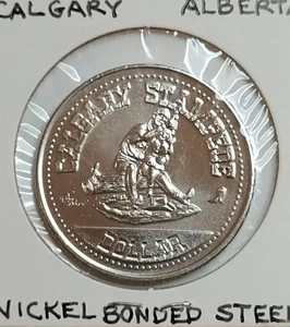 Ficha de dólar estampida Calgary Alberta 1980 $1 prueba como bota AB146d - Imagen 1 de 2
