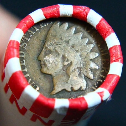 Indian Head Penny Showing On End Of 50 Coin Lincoln Wheat Roll Cover