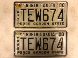 1980 NORTH DAKOTA Peace Garden State Truck License Plate TEW674 PAIR - Picture 1 of 1