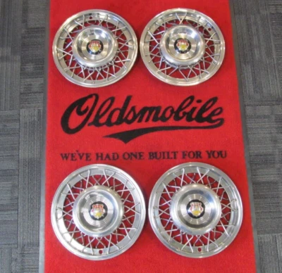 1953-1954 Oldsmobile 88 98 USED Mimetic Wire Wheel Cover Set # 9701107 Foto 1 de 4