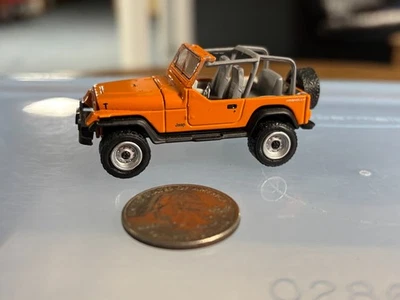Jeep Wrangler 1987 Greenlight - neumáticos de goma Foto 1 de 4