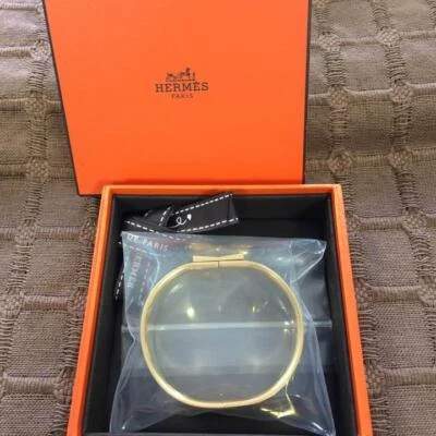 Brazalete Brazalete Hermes Email GM Tono Dorado/Negro con Caja Usado JPN Foto 1 de 4