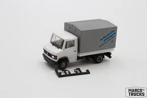 Herpa MB Mercedes Vario Pr/Pl white/black/grey „Großtransporter“ 1:87 /H24258 - Picture 1 of 1