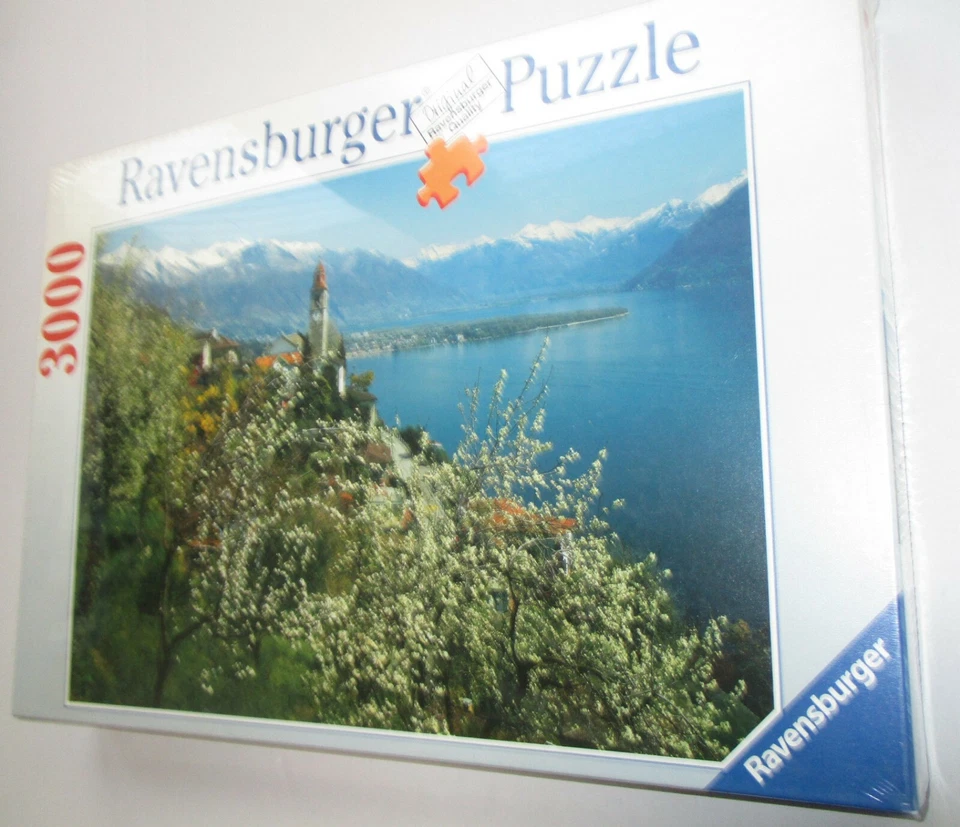 Ravensburger Puzzle 17018 Primavera Am Lago Maggiore, Tessin 3000 Pezzi Nuovo - Immagine 1 di 1