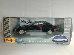 BMW 325i CONVERTIBLE BLU REF.31816 MAISTO SCALA 1/18 - Foto 1 di 4