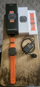 Samsung Galaxy Ultra Watch 47mm LTE Bluetooth Titanium Gray And Orange - Photo 1 sur 4