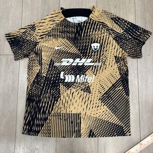 Nike Pumas UNAM Trikot Schwarz Und Gold XL X Large Mexiko DHL Dri Fit Selten 2022 - Bild 1 von 6