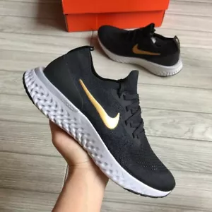 ENTRENADORES UNISEX NEGROS NIKE EPIC REACT FLYKNIT TALLA REINO UNIDO 7,5 EUR 42 (AQ0070 013) - Imagen 1 de 7