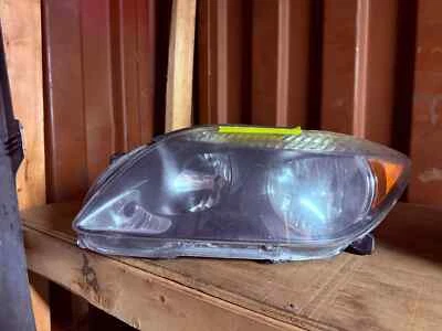 Faro izquierdo Toyota Scion-C 2005 2006 2007 lado del conductor fondo negro Foto 1 de 4