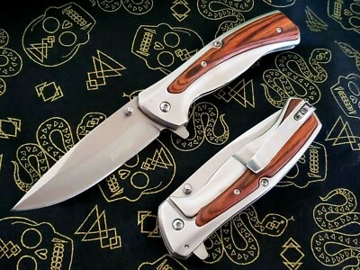 Navaja de Bolsillo Plateada Pakkawood Asistida por Resorte Punta Marco de Transporte Bloqueo Bonita Hoja Foto 1 de 4