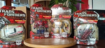 Hasbro Transformers Generations Optimus Prime Bumblebee Drift Thrust - Immagine 1 di 4