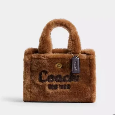 Nuevo bolso de mano Coach Cargo 20 esquila de peluche de piel de 2 vías Foto 1 de 4