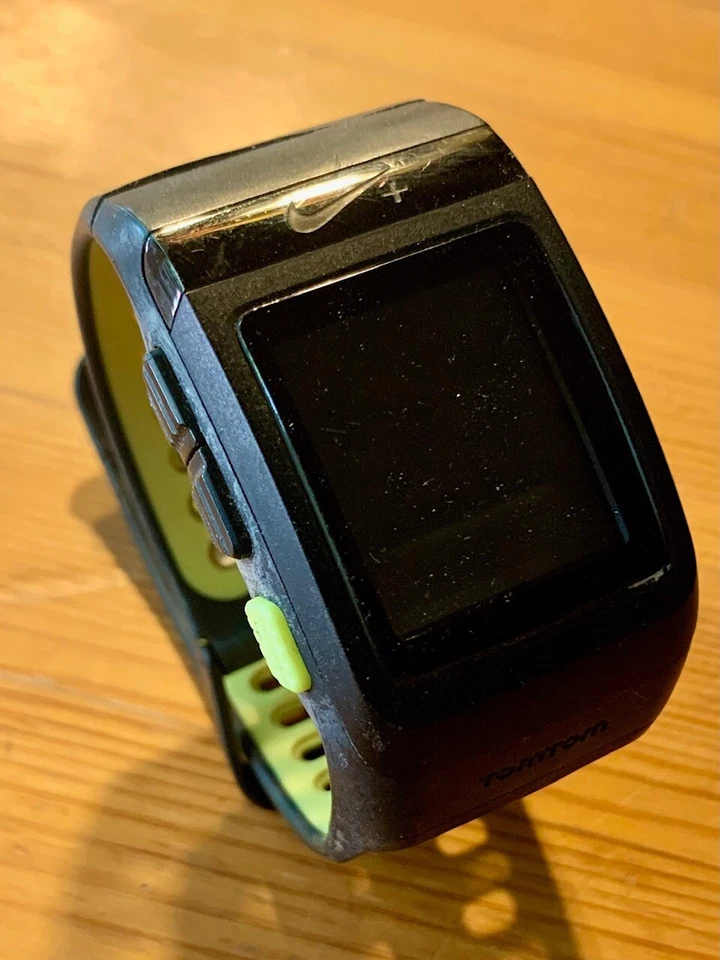 Reloj deportivo Nike+ GPS alimentado por TomTom negro/amarillo (solo reloj) piezas. Foto 1 de 1