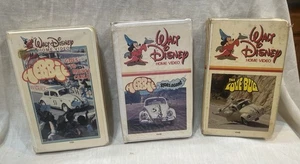 Vintage Clamshell HERBIE DISNEY VHS Movies LOVE BUG - RIDES AGAIN - MONTE CARLO - Picture 1 of 4