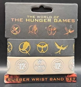 THE WORLD OF THE HUNGER GAMES ~ Gummi Armband Set ~ NEU!!! Einheitsgröße - Bild 1 von 2