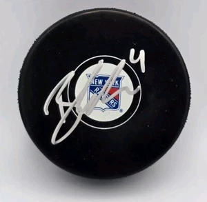 PUCK DE HOCKEY FIRMADO POR BRADEN SCHNEIDER NEW YORK RANGERS CERTIFICADO DE AUTENTICIDAD UG - Imagen 1 de 2