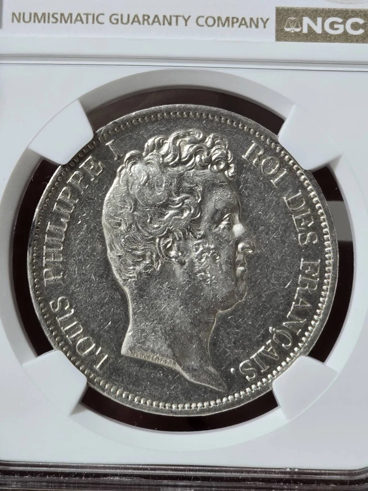 Moneda de 5 francos 1831A Francia cabeza desnuda levantada RARA NGC AU detalles limpiados  Foto 1 de 3