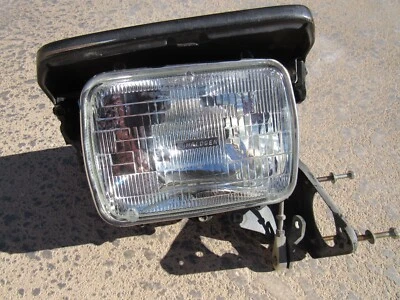 Conjunto de faros Toyota Supra 1986-92 sin motor diestro pasajeros probado Foto 1 de 4